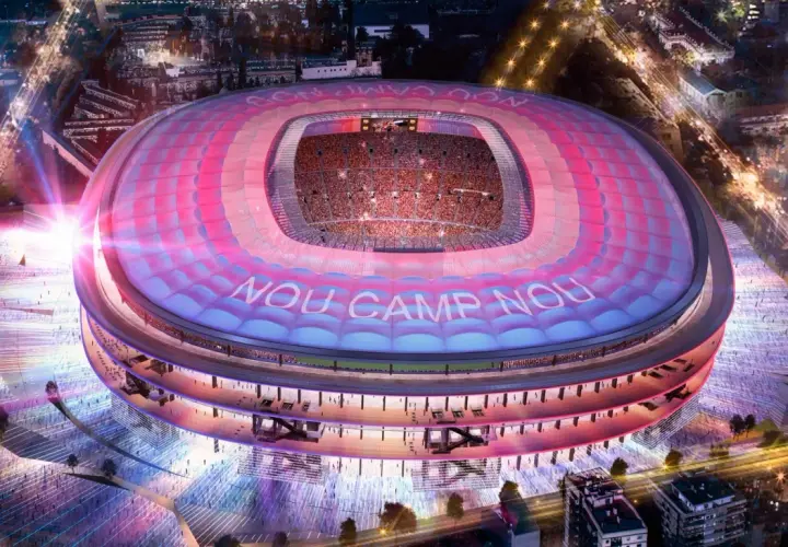 Nowy Camp Nou nocą, oświetlony różowo-niebieskimi światłami, z widocznymi trybunami i napisem "NOU CAMP NOU".